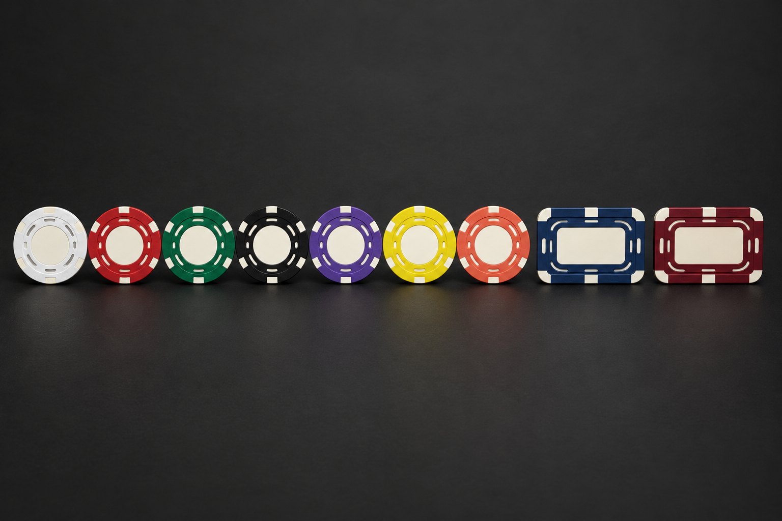 A series of chips and plaques, color-coded by value